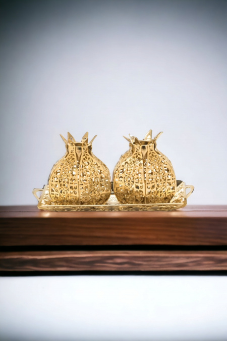 Bougeoirs au design de grenades recouverts d'or 24 carats