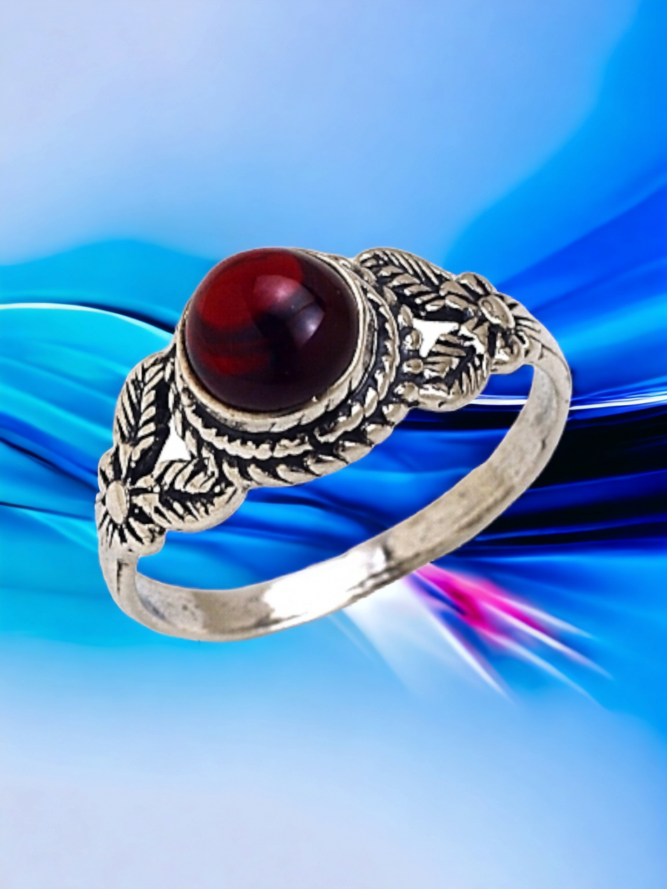 BAGUE EN ARGENT PUR SERTIE D'UNE PIERRE PRÉCIEUSE 